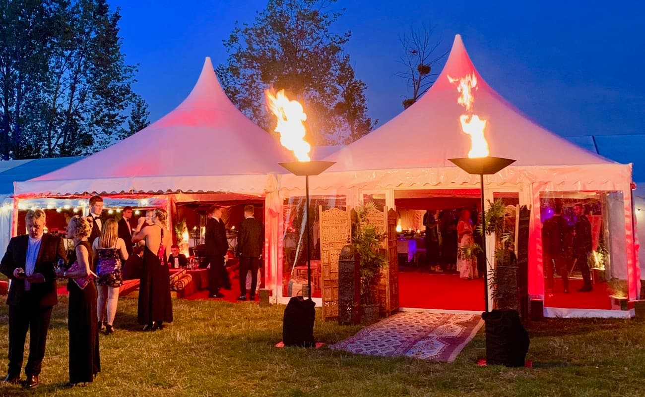 Pagoda marquees form the entrance to a marquee party