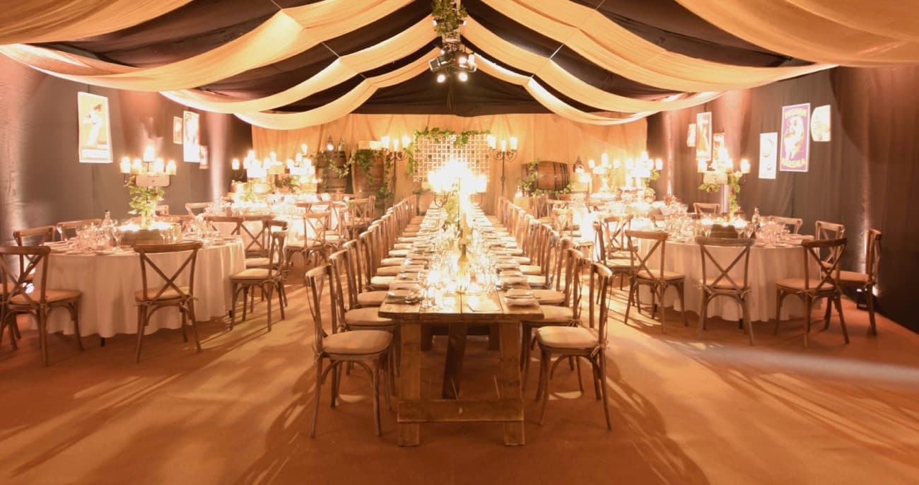 rustic tables in marquee