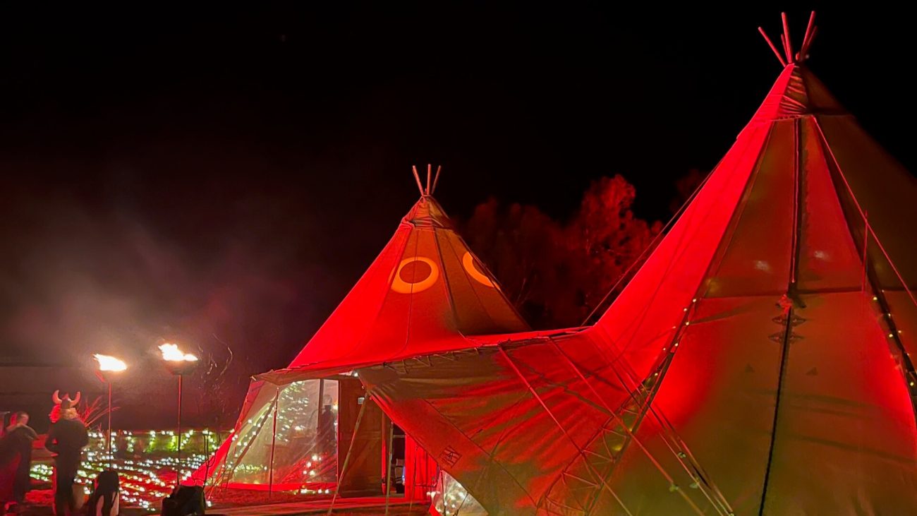 Two Tipi Marquees lit with red for a Game of Thrones themed party